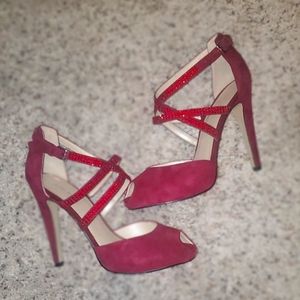 Peep toe sparkly cranberry pumps.